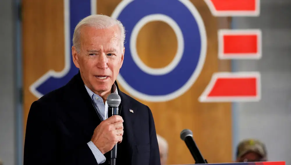 FILE PHOTO: Democratic 2020 U.S. presidential candidate and former U.S. Vice President Joe Biden speaks during a meeting at Chickasaw Event Center in New Hampton, Iowa