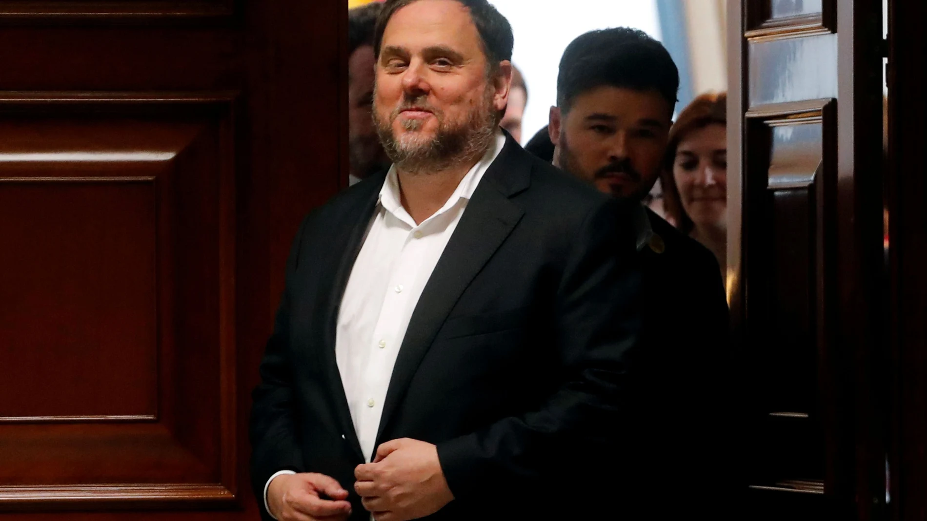 FILE PHOTO: Jailed Catalan politician Oriol Junqueras leaves after getting his parliamentary credentials at Spanish Parliament, in Madrid
