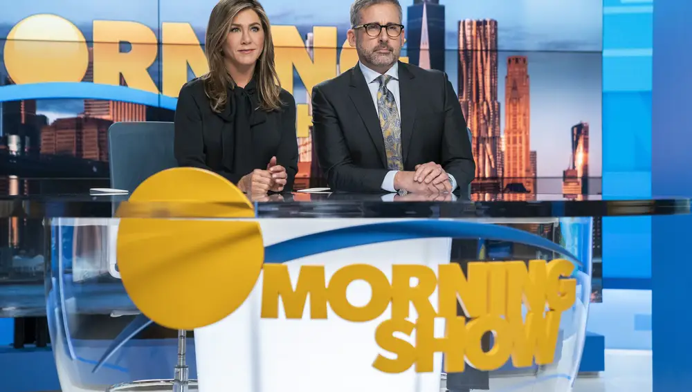 This image released by Apple TV Plus shows Jennifer Aniston, left, and Steve Carell in a scene from &quot;The Morning Show.&quot; The program is nominated for a Golden Globe for best television drama series. (Hilary B. Gayle/Apple TV Plus via AP)