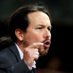 El líder de Unidas Podemos, Pablo Iglesias, durante su intervención ante el pleno del Congreso de los Diputados en la primera jornada de la sesión de investidura de Pedro Sánchez como presidente del Gobierno