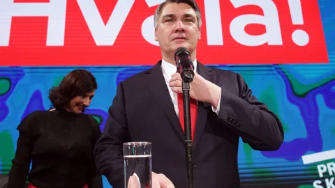 Zagreb (Croatia), 05/01/2020.- Croatian presidential candidate of Social Democratic Party (SDP) Zoran Milanovic (R) speaks to supporters as his wife Sanja Pusic (L) looks on during an election night rally in Zagreb, Croatia, 05 January 2020. According to initial exit polls, milanovic has won presidential elections with 54 percent of votes ahead of incumbent president Kolinda Grabar-Kitarovic. (Elecciones, Croacia) EFE/EPA/DANIEL KASAP