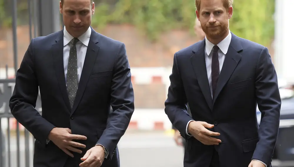 FILE - In this Tuesday, Sept. 5, 2017 file photo, Britain's Prince William, the Duke of Cambridge, left, and Prince Harry arrive to visit the Support4Grenfell Community Hub in London. Britain's Queen Elizabeth II is set to hold face-to-face talks Monday, Jan. 13, 2020 with Prince Harry for the first time since he and his wife, Meghan, unveiled their controversial plan to walk away from royal roles â€” at a dramatic family summit meant to chart a future course for the couple. The meeting at the monarch's private Sandringham estate in eastern England will also include Harry's father Prince Charles and his brother Prince William. (Toby Melville/ Pool via AP, File)