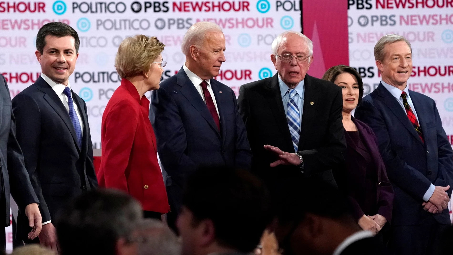 FILE PHOTO: Candidates on stage at the sixth 2020 U.S. Democratic presidential candidates campaign debate at Loyola Marymount University in Los Angeles, California, U.S.