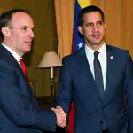 Venezuela&#39;s opposition leader Juan Guaido, shakes hands with British Foreign Secretary Dominic Raab at Foreign Office in London, Britain January 21, 2020.