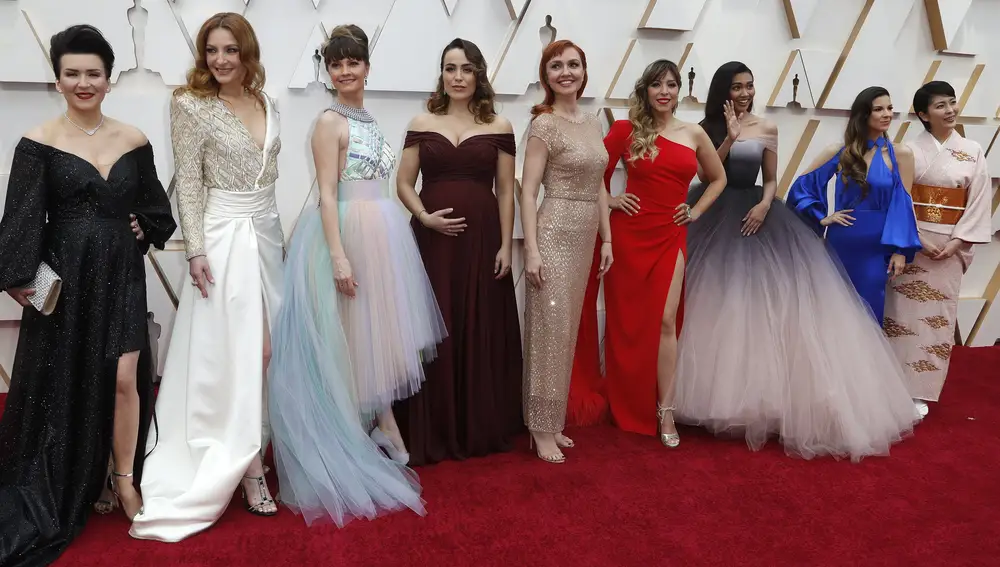 Actresses who voice the character of Elsa in Disney's Frozen movie (L to R) Maria Lucia Heiberg Rosenberg, Willemijn Verkaik, Takako Matsu, Carmen Garcia Saenz, Lisa Stokke, Kasia Laska, Anna Buturlina, Gisela and Gam Wichayanee pose on the red carpet during the Oscars arrivals at the 92nd Academy Awards in Hollywood, Los Angeles, California, U.S., February 9, 2020. REUTERS/Eric Gaillard