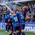Los jugadores del Huesca celebran un gol.