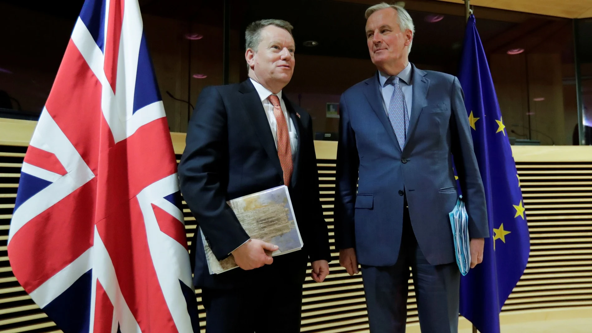 FILE PHOTO: European Union chief Brexit negotiator Michel Barnier and British Prime Minister's Europe adviser David Frost 5 are seen at start of the first round of post -Brexit trade deal talks