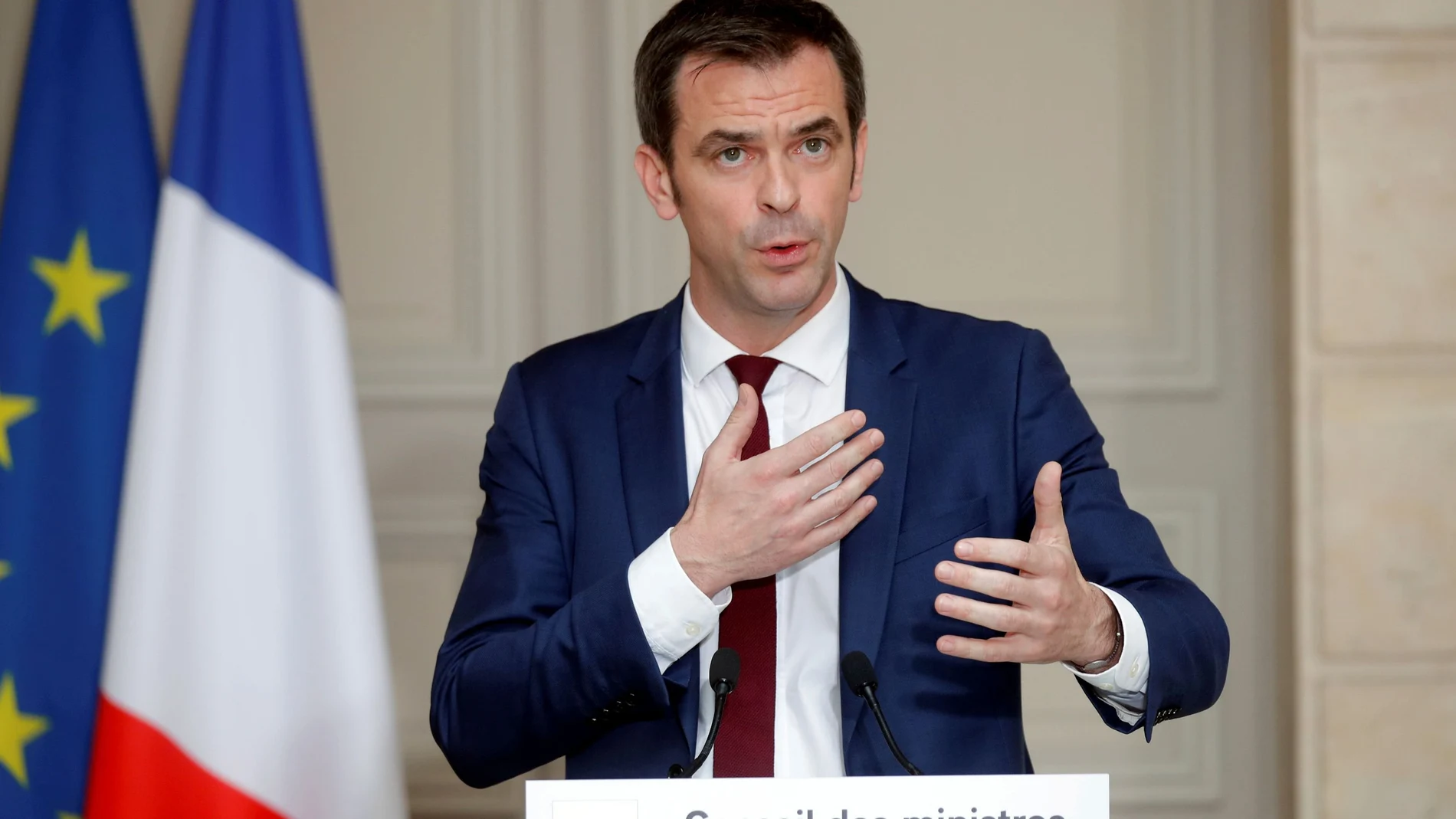 FILE PHOTO: French Health and Solidarity Minister Olivier Veran speaks after attending a weekly cabinet meeting at the Elysee Palace in Paris