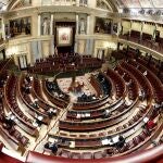 Un momento del pleno celebrado este miércoles en el Congreso de los Diputados en Madrid, que ha contado con una asistencia reducida de parlamentarios a causa de las medidas para contener el coronavirus. Además de la convalidación de los decretos económicos para paliar las consecuencias sociales de la pandemia del coronavirus, el Congreso debate la prórroga del estado de alarma hasta el próximo 11 de abril. EFE/Mariscal POOL