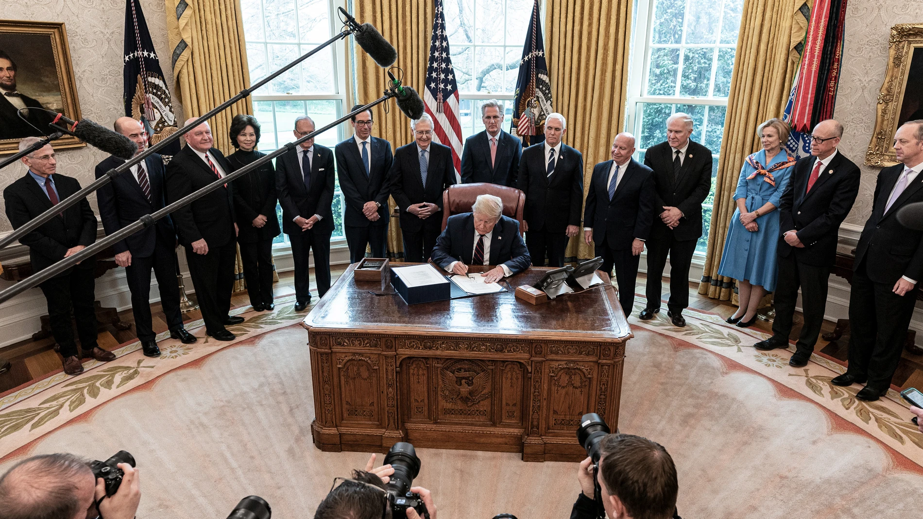 US President Trump signs coronavirus rescue package