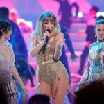 FILE PHOTO: 2019 American Music Awards - Show - Los Angeles, California, U.S., November 24, 2019 - Camila Cabello, Taylor Swift and Halsey perform. REUTERS/Mario Anzuoni/File Photo