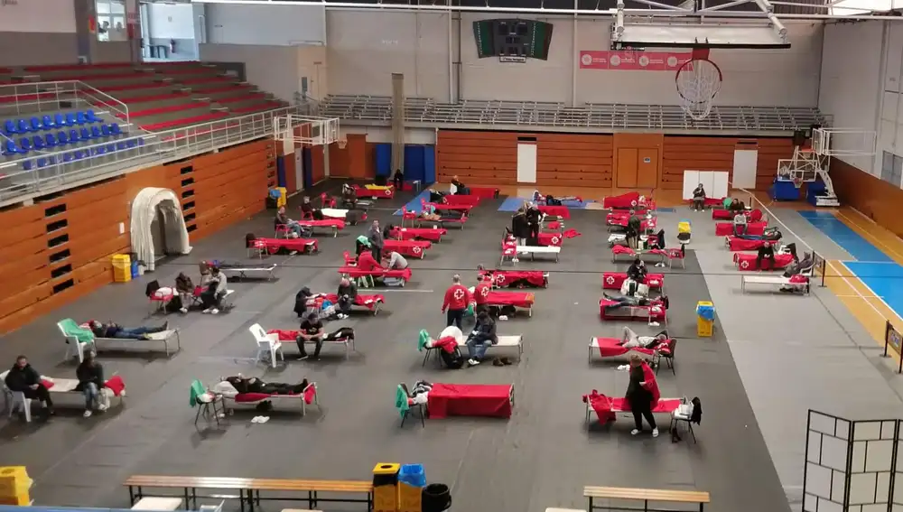 Centro de acogida para personas sin hogar habilitado por Cruz Roja durante la crisis del coronavirus