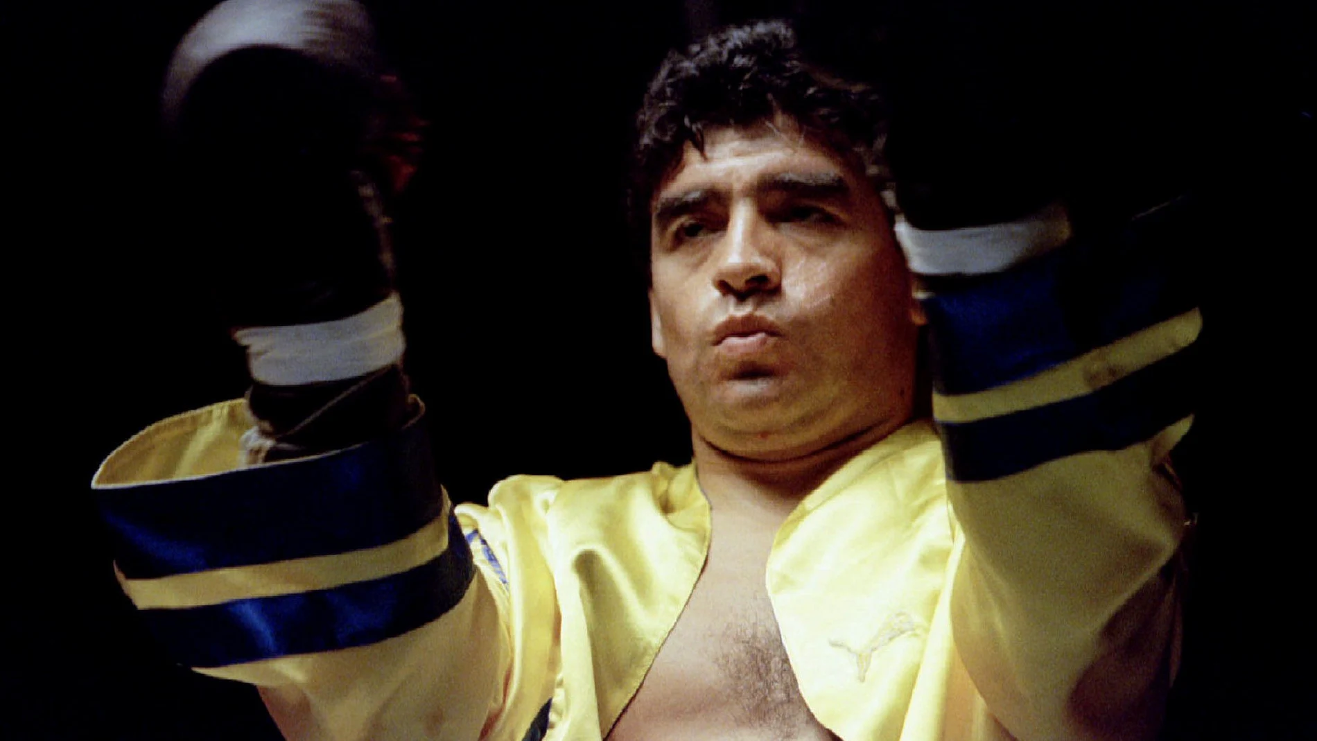 FILE PHOTO: Argentina's Diego Maradona warms up before his exhibition fight against former WBC super flyweight champion Santos Laciar