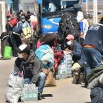 Ciudadanos bolivianos en la frontera con Chile