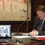El presidente de la Generalitat, hoy durante la videoconferencia con la CEV