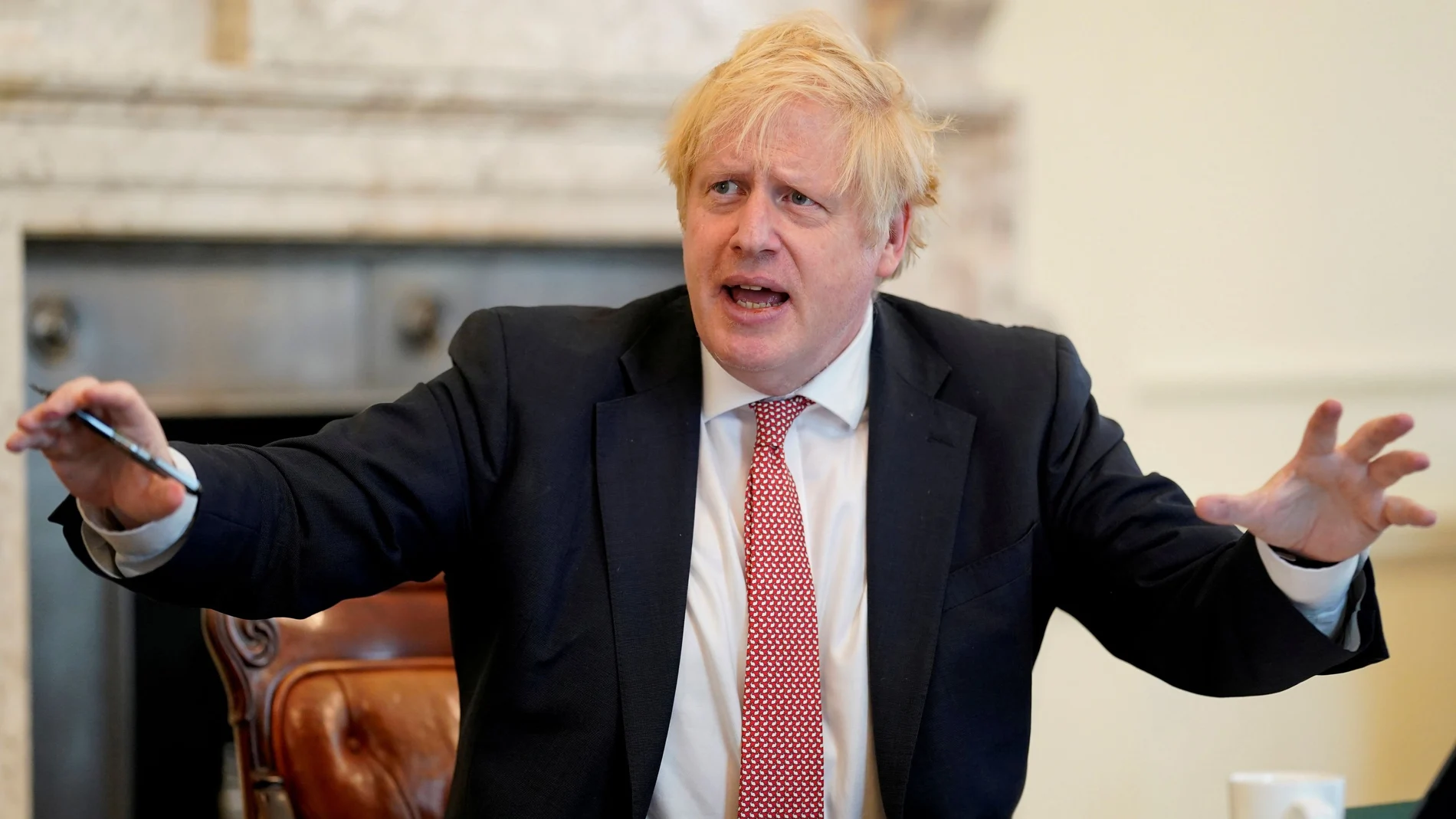 Britain's Prime Minister Boris Johnson chairs a meeting to update on the coronavirus disease (COVID-19), at 10 Downing Street in Londo