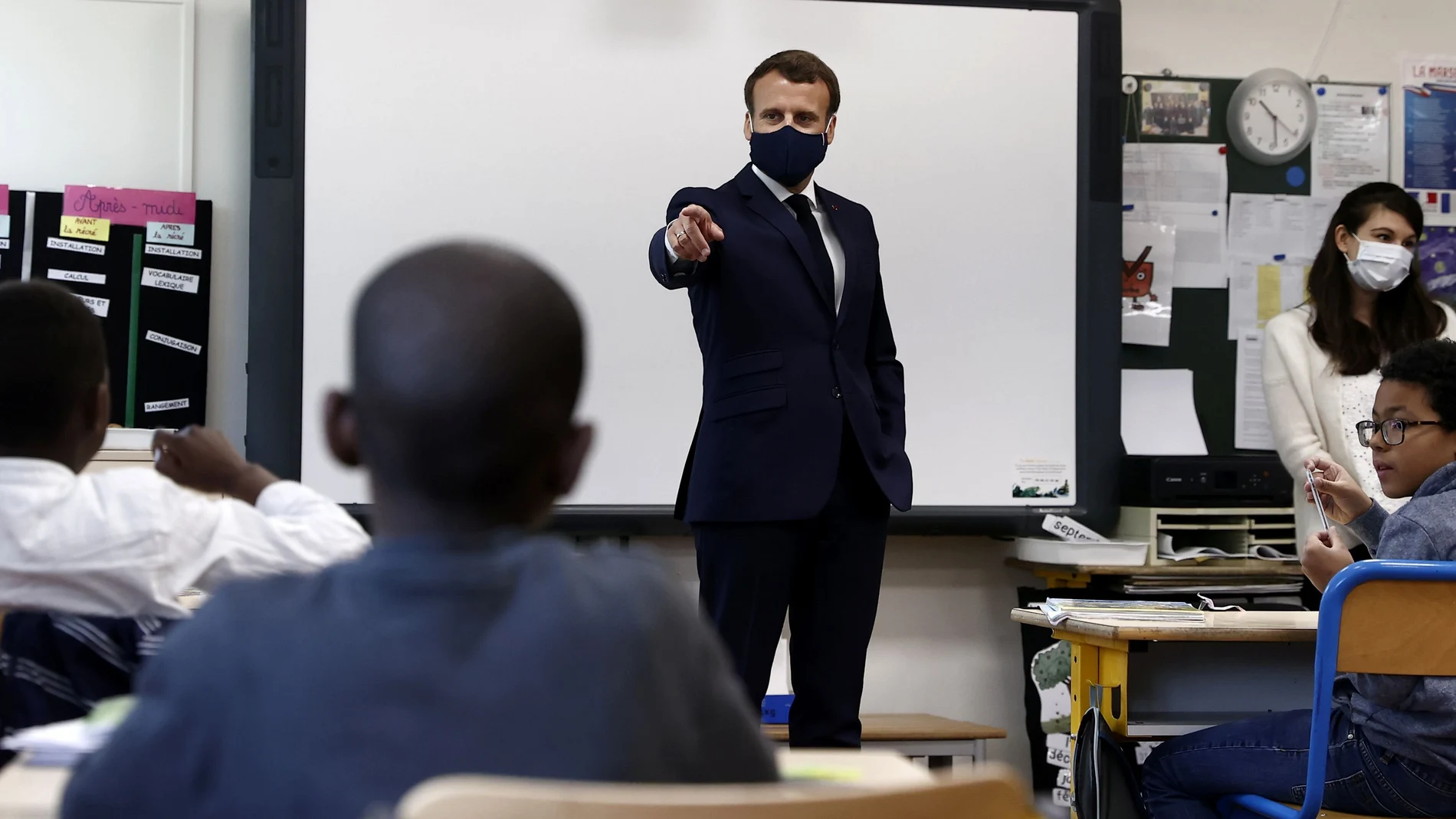 French President Macron visits a school in Poissy