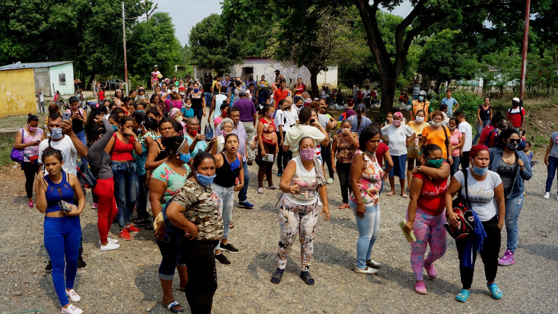FILE PHOTO: Relatives of inmates protest outside Los Llanos penitentiary after a riot erupted inside the prison leaving dozens of dead as the coronavirus disease (COVID-19) continues in Guanare