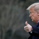 FILE PHOTO: U.S. President Donald Trump gestures to reporters as he departs for travel to Scranton, Pennsylvania from the South Lawn of the White House in Washington, U.S., March 5, 2020. REUTERS/Carlos Barria/File Photo