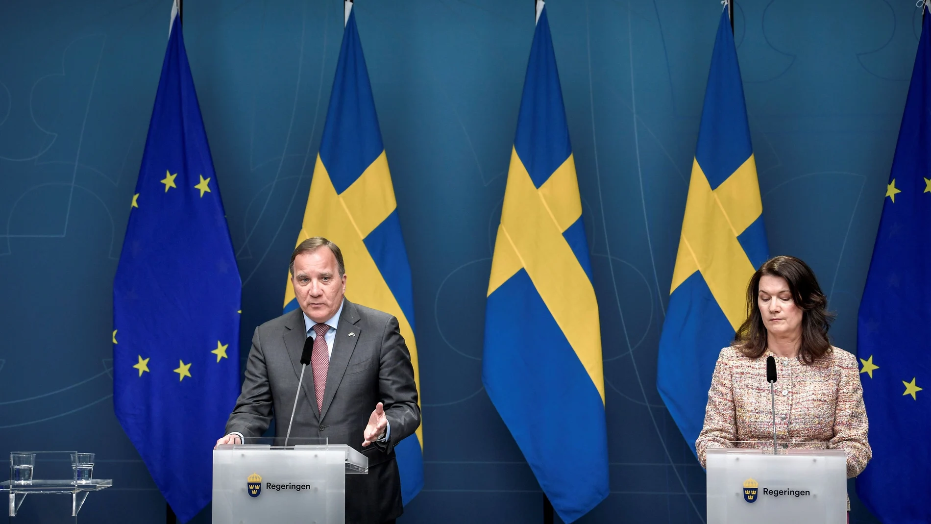 Sweden's Prime Minister Stefan Lofven speaks next to Sweden's Foreign Minister Ann Linde during a news conference on the coronavirus disease (COVID-19) situation, in Stockholm