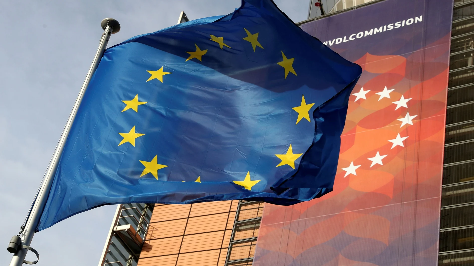 FILE PHOTO: A European Union flag flies outside the European Commission headquarters in Brussels