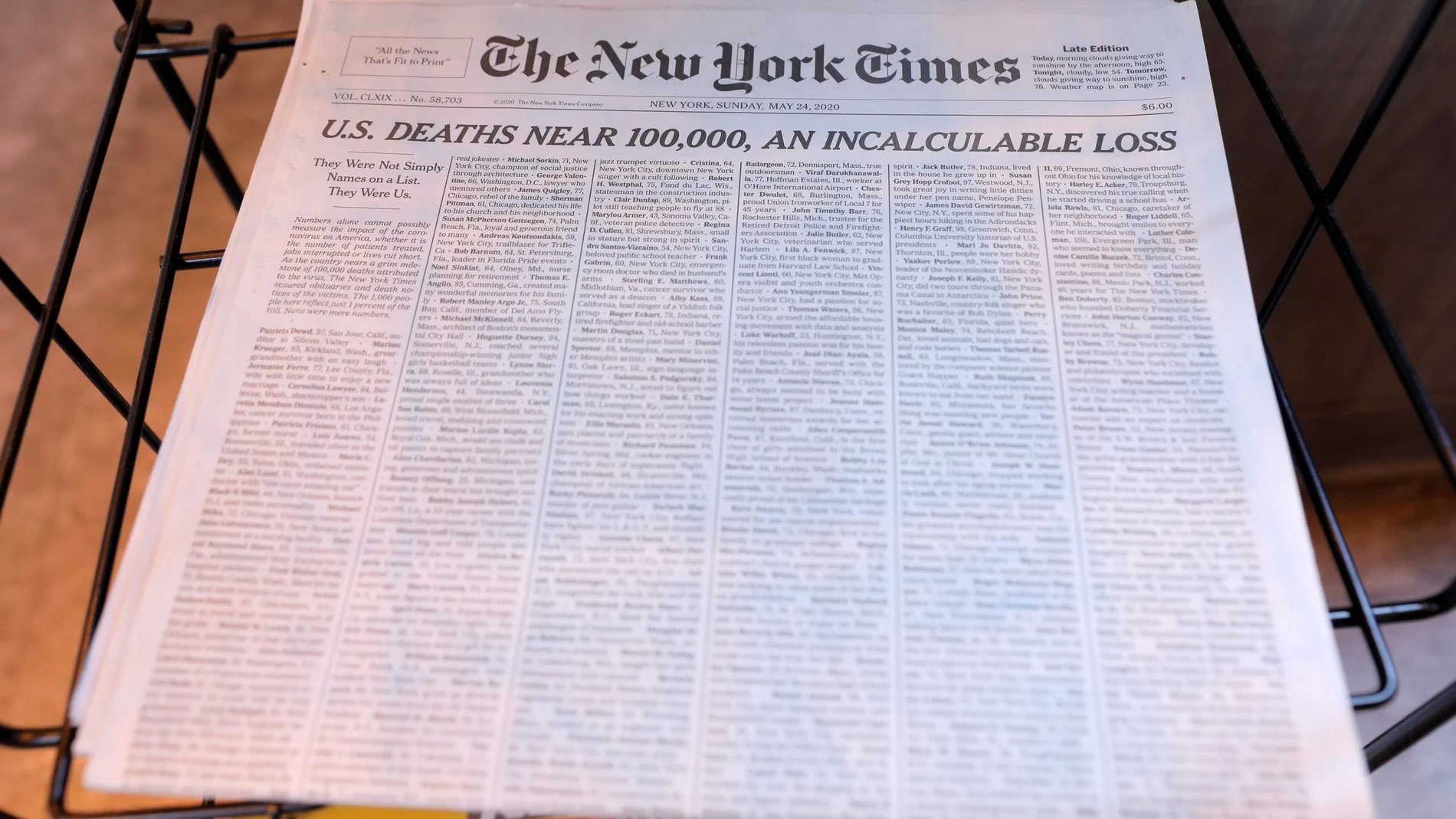 The New York Times cover regarding the 100,000th death of the coronavirus disease (COVID-19) in Manhattan, New York City