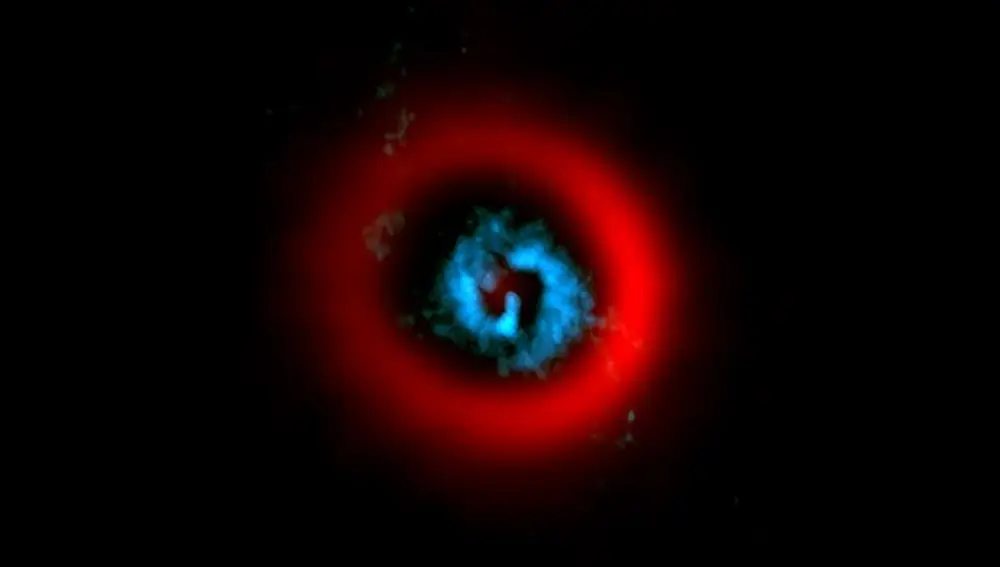 Imagen tomada por ALMA del disco circumestelar de AB Aurigae que revela espirales de gas (en azul)