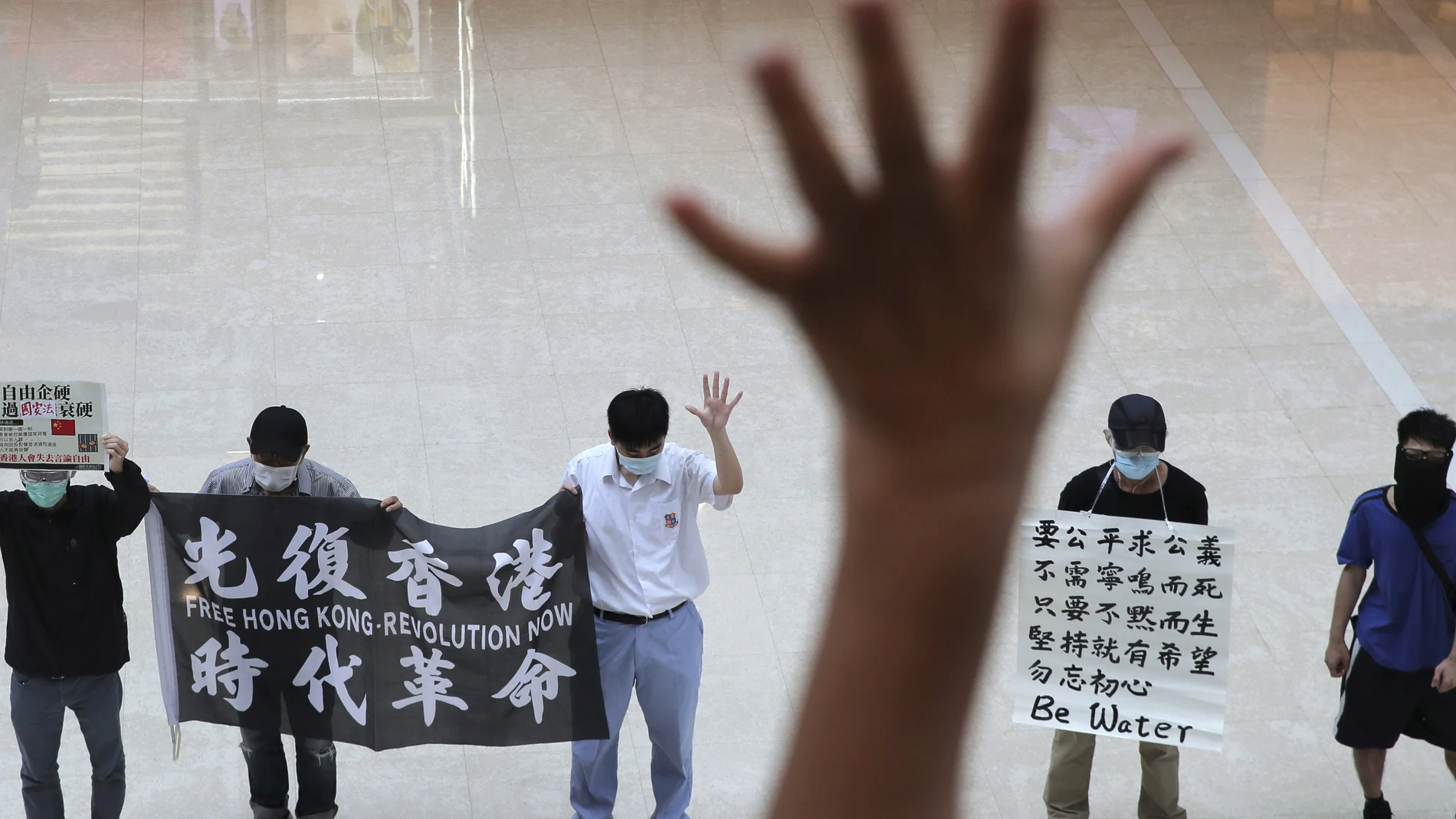 Una manifestación contra China exigiendo las "cinco demandas" en Hong Kong