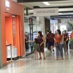 People wearing protective face masks are seen inside Nova America shopping mall, as malls reopen amid the coronavirus disease (COVID-19) outbreak, in Rio de Janeiro, Brazil, June 11, 2020. REUTERS/Ricardo Moraes