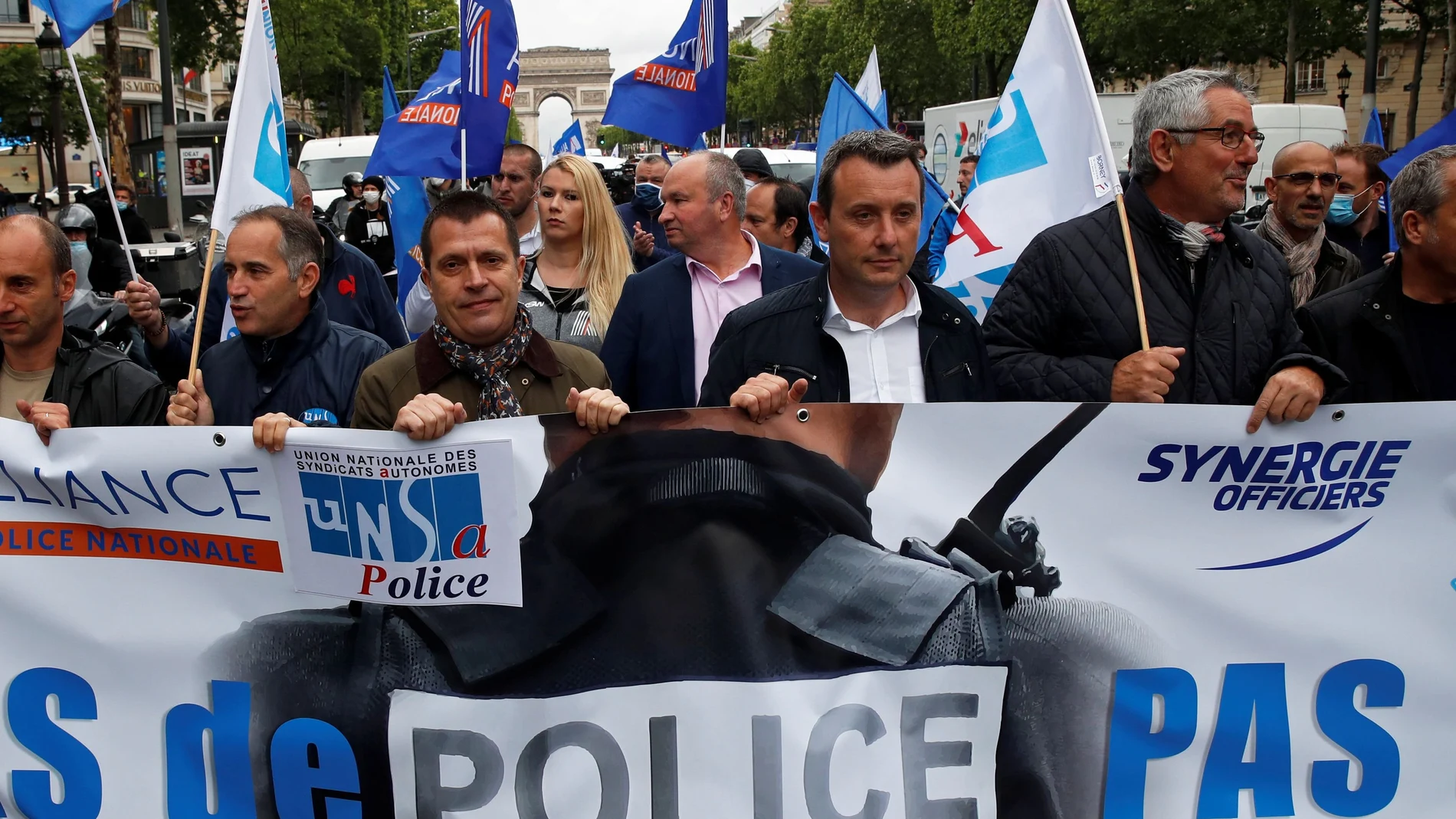 Police officers attend a demonstration in Paris