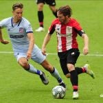 Marcos Llorente presiona a Muniain