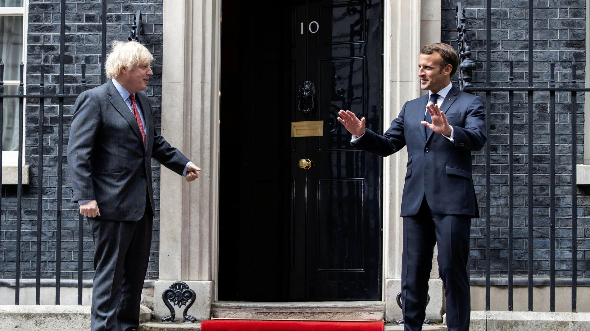 British Prime Minister Boris Johnson meets French President Emmanuel Macron in London