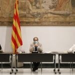 El presidente de la Generalitat, Quim Torra, junto a su vicepresidente, Pere Aragonés y la consellera de Presidencia, Meritxell Budó, esta mañana.