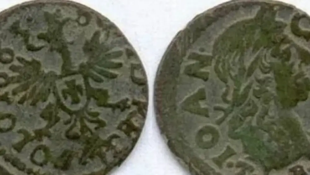 Las monedas halladas como parte de un rito funerario