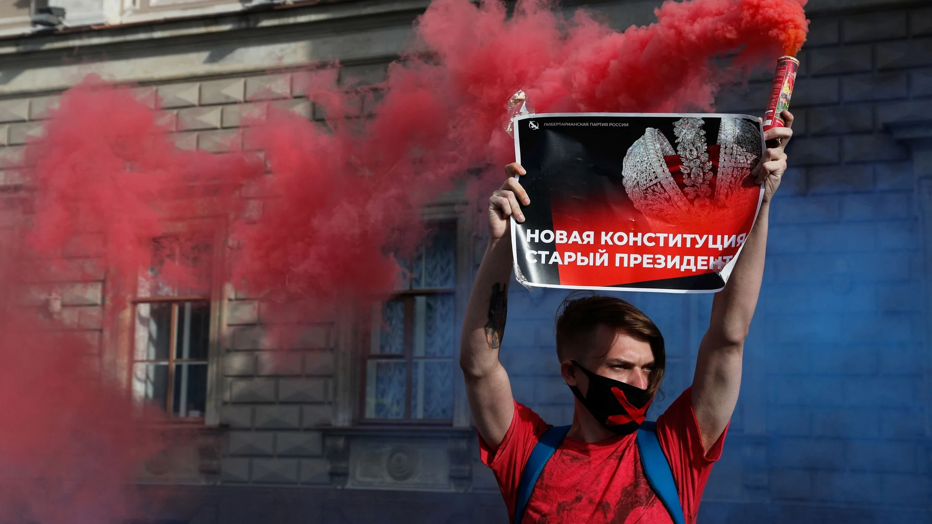 An activist takes part in a protest against amendments to Russia's Constitution in central Saint Petersburg