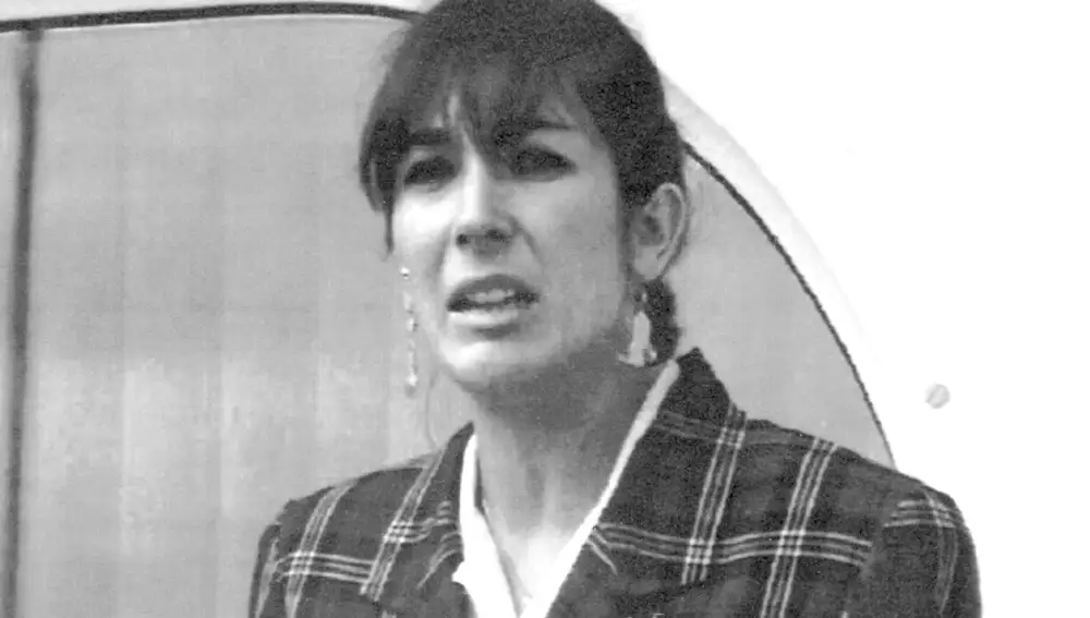 FILE - In this Nov. 7, 1991, file photo Ghislaine Maxwell, daughter of late British publisher Robert Maxwell, reads a statement in Spanish in which she expressed her family's gratitude to the Spanish authorities, aboard the &quot;Lady Ghislaine&quot; in Santa Cruz de Tenerife. Maxwell, a British socialite who was accused by many women of helping procure underage sex partners for Jeffrey Epstein, was arrested in New Hampshire, the FBI said Thursday, July 2, 2020. (AP Photo/Dominique Mollard, File)