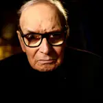 FILE PHOTO: Italian composer Ennio Morricone, poses for a portrait during an interview with Reuters before performing on stage at the O2 Arena in London, Britain February 16, 2016. REUTERS/Dylan Martinez/File Photo