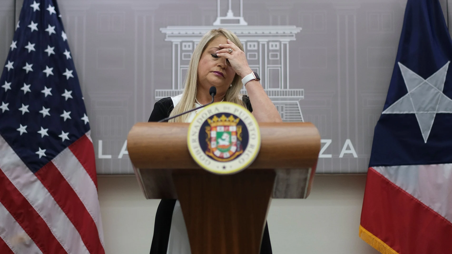 Puerto Rico's Governor Wanda Vazquez reacts during a news conference in San Juan