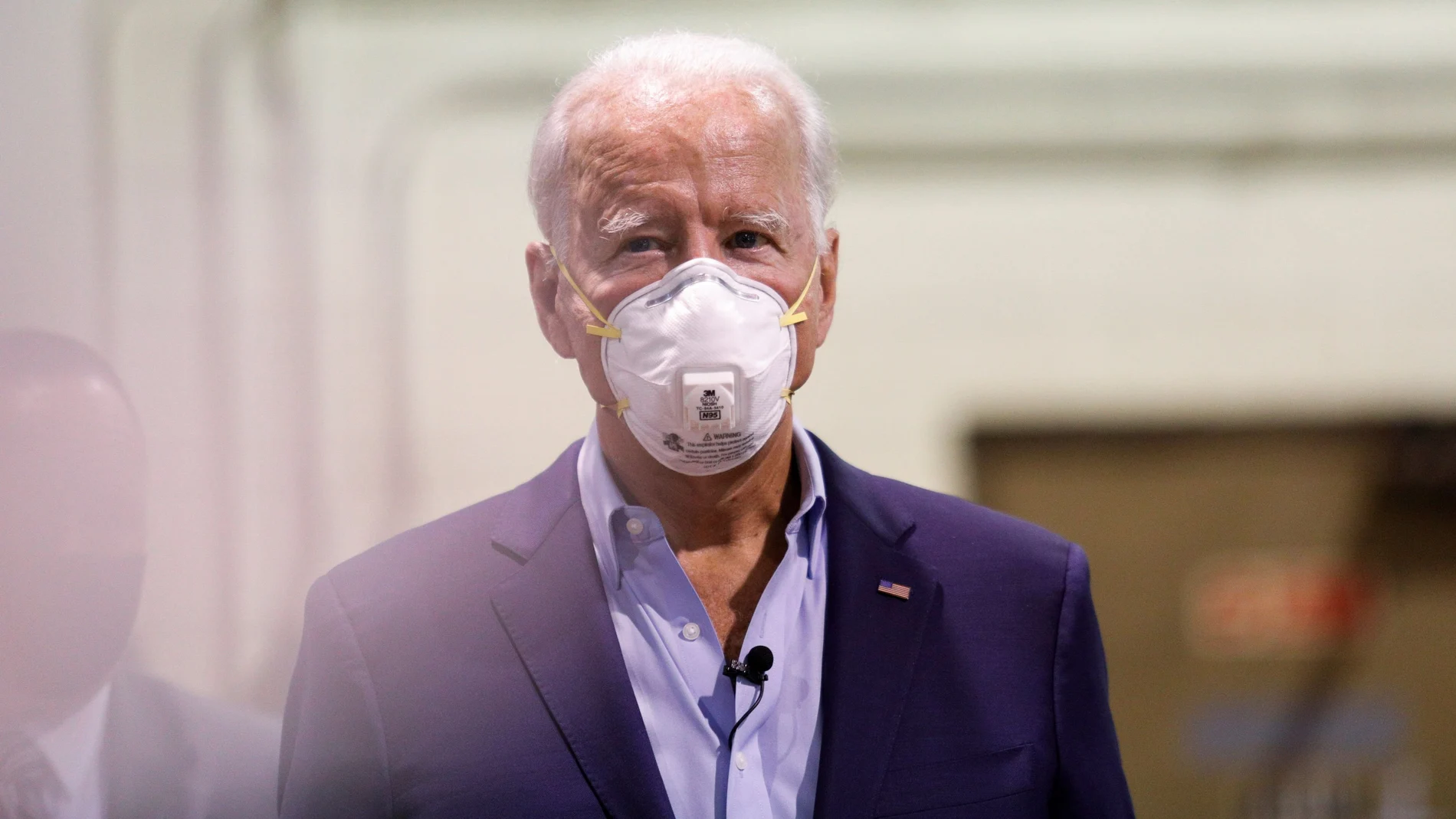 Democratic U.S. presidential candidate Joe Biden wears a protective face mask as he tours a metal works plant in Dunmore, Pennsylvania