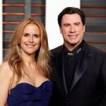 FILE PHOTO: Actress Kelly Preston and husband, actor John Travolta, arrive at the 2015 Vanity Fair Oscar Party in Beverly Hills, California February 22, 2015. REUTERS/Danny Moloshok/File Photo