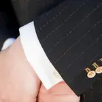 A close up of the world&#39;s most expensive suit, showing the gold buttons encrusted with diamonds, and the 24 carat gold pinstripes. The suit, designed by Alexander Amosu, is the centrepiece of his collection, newly launched in London.