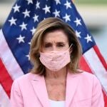 U.S. House Speaker Nancy Pelosi wears a protective mask at a bill enrollment ceremony for the Great American Outdoors Act, in Washington, U.S. July 23, 2020. REUTERS/Erin Scott TPX IMAGES OF THE DAY