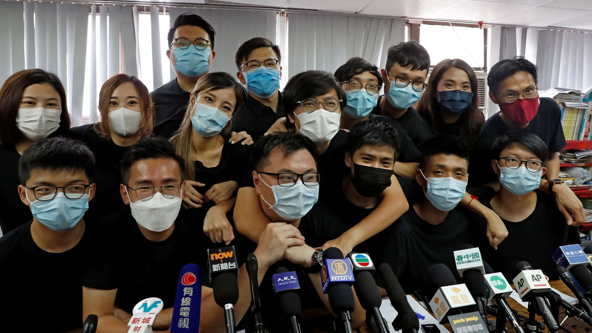 FILE PHOTO: Young Hong Kong democrats from the so-called "resistance" or localists camp attend a news conference after pre-election in Hong Kong