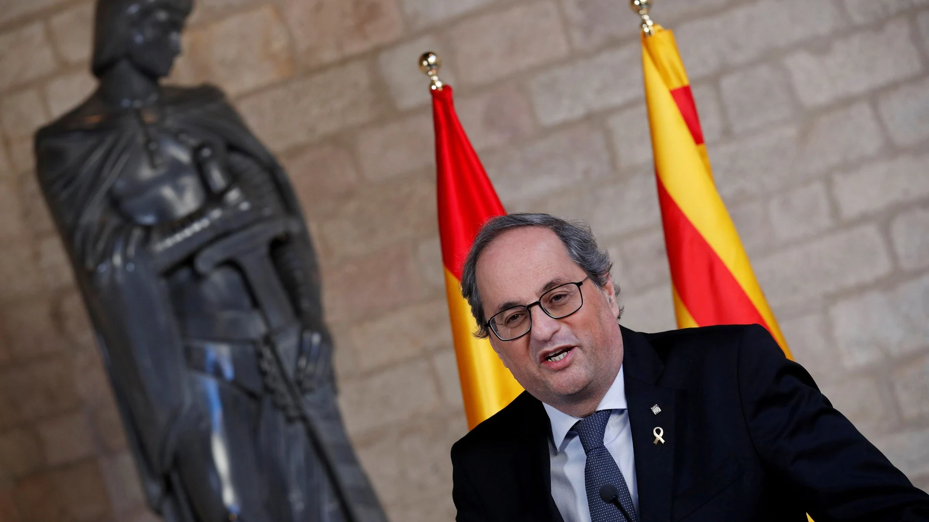 FILE PHOTO: Spain's PM Sanchez and Catalan regional leader Torra meet in Barcelona