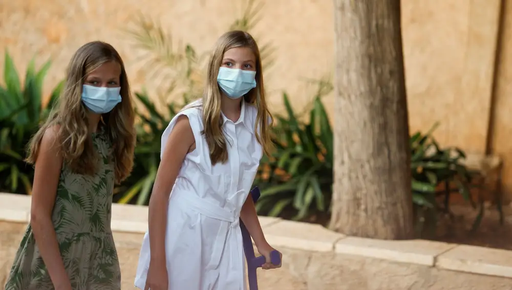 Spain's Princess Leonor and Infanta Sofia walk in the streets of the village of Petra during their visit to the birthplace and museum of Franciscan monk Fray Junipero Serra in Mallorca, Spain August 10, 2020. REUTERS/Enrique Calvo