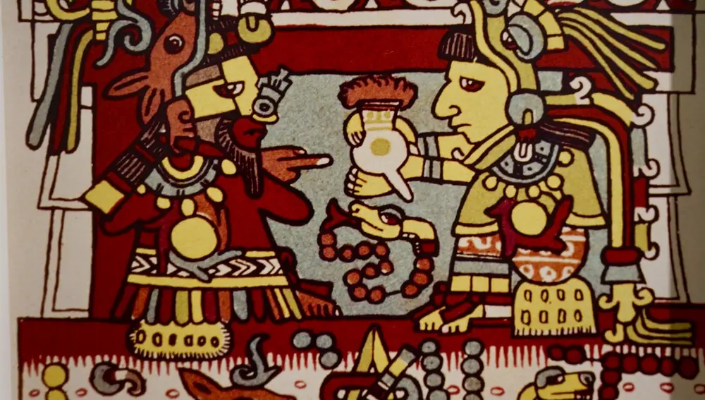Religiosos aztecas bebiendo chocolate.