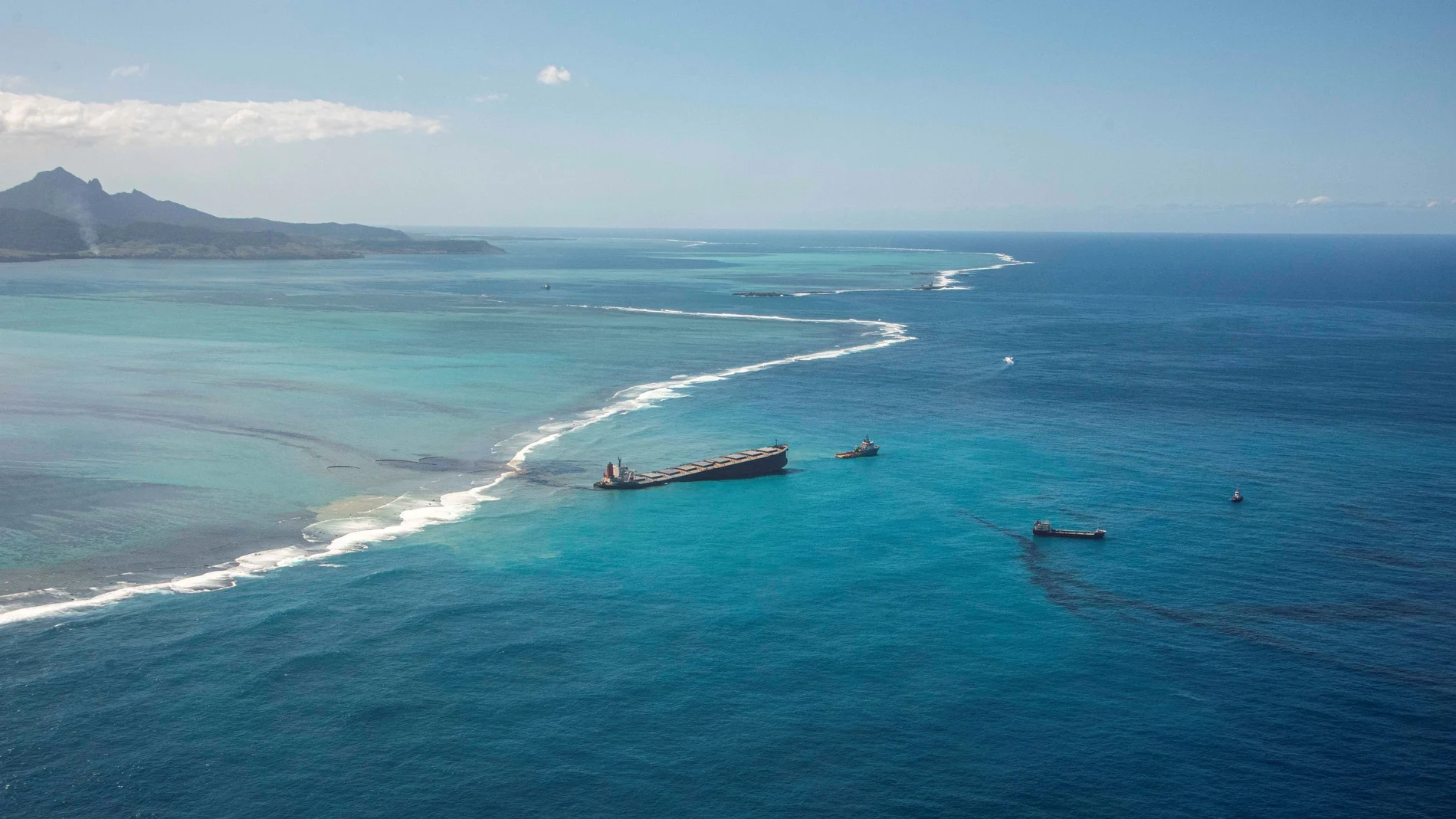 FILE PHOTO: A general view shows the bulk carrier ship MV Wakashio, that ran aground on a reef, at Riviere des Creoles
