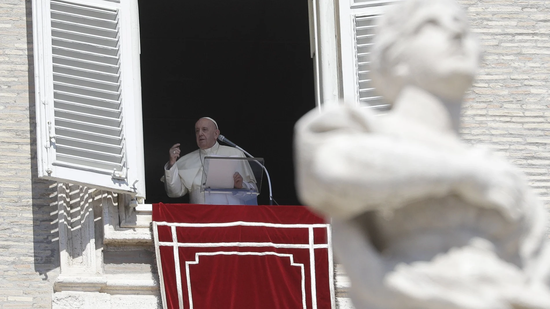 Pope Francis delivers the Angelus noon prayer from his studio window overlooking St. Peter's Square, at the Vatican, Sunday, Sept. 6, 2020. (AP Photo/Gregorio Borgia)