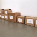 Imagen de las cajas que contienen las mascarillas que van a ser repartidas por la Diputación de Málaga