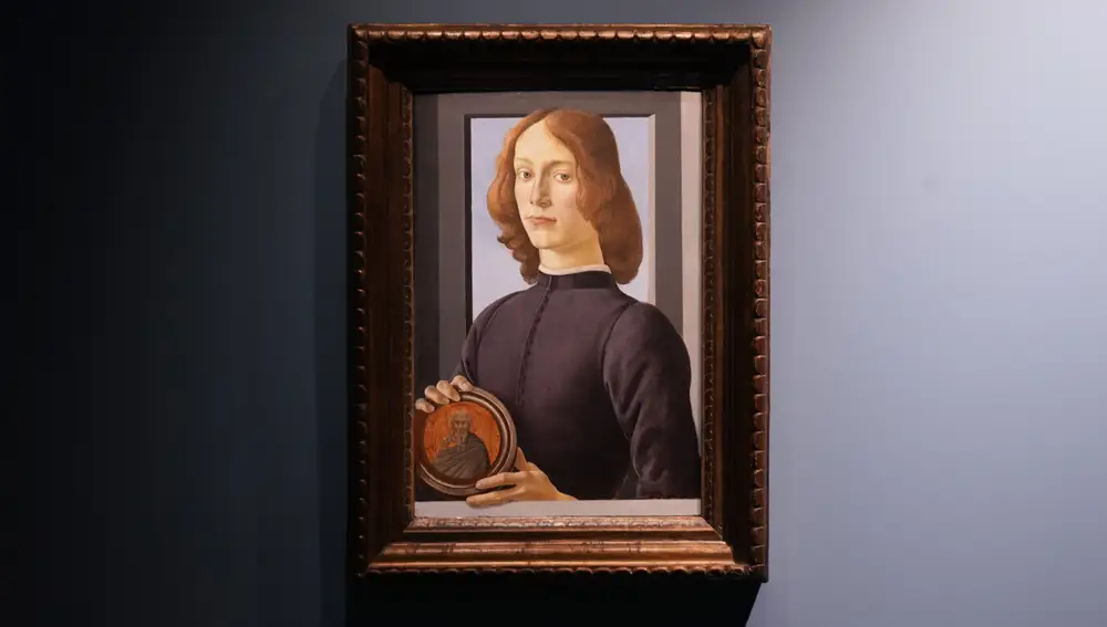 Sandro Botticelli's 15th-century painting called &quot;Young Man Holding a Roundel&quot; is displayed at Sotheby's on Sept. 23, 2020, in New York. The painting will go on auction next year and art watchers will be seeing if it fetches more than its eye-watering $80 million estimate, despite the pandemic. Botticelliâ€™s 15th-century portrait of a nobleman in â€œYoung Man Holding a Roundelâ€ is the highlight of Sothebyâ€™s Masters Week sale series in New York in January. (AP Photo/Seth Wenig)